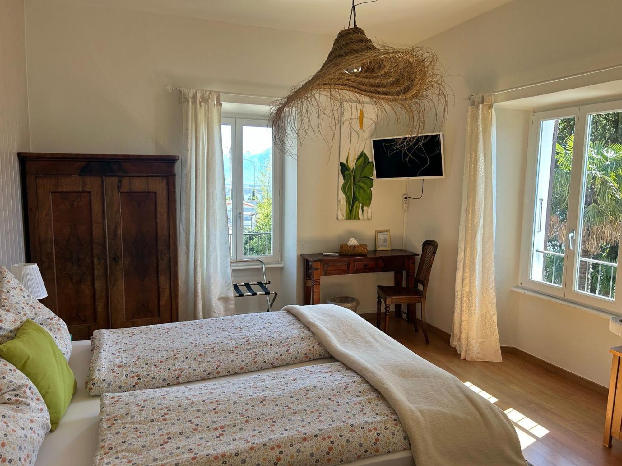 Chambre Familiale avec Douche et Toilettes Communes